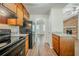 Open kitchen showcasing modern appliances and convenient access to the adjacent living area at 1934 Patton Pl, Lithonia, GA 30058