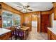 Inviting breakfast nook with a ceiling fan and ample sunlight at 2624 Lake Erin Drive Dr, Tucker, GA 30084