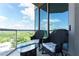 Relaxing balcony area offering seating with a view of the trees and sky at 2795 Peachtree Ne Rd # 1009, Atlanta, GA 30305