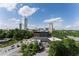 Beautiful city view from property, showing trees and buildings with bright blue sky at 2795 Peachtree Ne Rd # 1009, Atlanta, GA 30305
