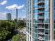 High-rise building featuring city views, trees and balcony at 2795 Peachtree Ne Rd # 1009, Atlanta, GA 30305