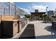 Outdoor grilling area with built-in grill, seating, and views of the surrounding landscape at 2795 Peachtree Ne Rd # 1009, Atlanta, GA 30305