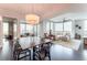 Bright living room with hardwood floors, modern furnishings, and city views from large windows at 2795 Peachtree Ne Rd # 1009, Atlanta, GA 30305
