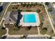 Aerial view of a community pool surrounded by lush landscaping at 416 Montclair Ct, Woodstock, GA 30188