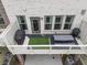 Aerial view of the back porch with outdoor grill and outdoor seating area at 416 Montclair Ct, Woodstock, GA 30188