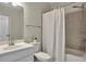 Cozy bathroom with a shower and vanity, enhanced by natural light at 416 Montclair Ct, Woodstock, GA 30188