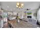 An open floor plan connecting the kitchen, dining area, and living room at 416 Montclair Ct, Woodstock, GA 30188
