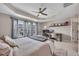 Comfortable main bedroom with tray ceiling and natural light from the window at 416 Montclair Ct, Woodstock, GA 30188