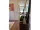 Hallway with modern wainscoting offers a glimpse into an inviting living space at 6930 Pond View Dr, Cumming, GA 30028