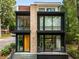 Modern two-story home with sleek design and large windows at 819 Belgrade Ne Ave, Atlanta, GA 30306