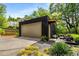 Modern detached garage with a seating area at 819 Belgrade Ne Ave, Atlanta, GA 30306