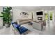 Bright living area with large windows, fireplace, modern furniture, and access to the outdoors at 819 Belgrade Ne Ave, Atlanta, GA 30306