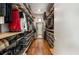 Well-organized walk-in closet with ample shelving and storage solutions for clothing and accessories at 819 Belgrade Ne Ave, Atlanta, GA 30306
