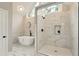 Modern bathroom with a tub, a walk-in shower, and a window at 1911 Woodmont Ct, Marietta, GA 30062
