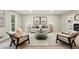 Cozy living room with neutral paint, fireplace, and seating for comfortable gatherings at 1911 Woodmont Ct, Marietta, GA 30062