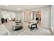 Open-concept living room with abundant seating and access to other living spaces at 1911 Woodmont Ct, Marietta, GA 30062