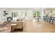 Spacious living area with hardwood floors, built-ins, and seamless flow to other rooms at 1911 Woodmont Ct, Marietta, GA 30062