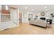 Inviting living room with hardwood floors, a fireplace, and comfortable seating arrangement at 1911 Woodmont Ct, Marietta, GA 30062