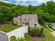 Spacious suburban home with lush landscaping, mature trees, and charming curb appeal at 200 Glenview Ct, Woodstock, GA 30188