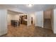 Finished basement with kitchenette, stairs to upper level, and hallway to bathroom at 200 Glenview Ct, Woodstock, GA 30188