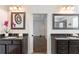 Dual vanities and updated fixtures enhance this light and bright bathroom space at 200 Glenview Ct, Woodstock, GA 30188