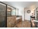 Luxurious bathroom features a glass shower, soaking tub, and elegant tile work at 200 Glenview Ct, Woodstock, GA 30188