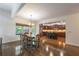 Charming dining area next to a modern kitchen with stainless steel appliances and island at 200 Glenview Ct, Woodstock, GA 30188