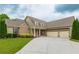 Traditional home featuring a lush front lawn, driveway and a two-car garage at 200 Glenview Ct, Woodstock, GA 30188