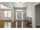 Bright foyer with hardwood floors and a bench at 200 Glenview Ct, Woodstock, GA 30188