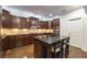 Beautiful kitchen with dark wood cabinets and granite countertops at 200 Glenview Ct, Woodstock, GA 30188