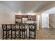 Finished basement features a bar and kitchenette with stainless steel appliances and dark wood cabinetry at 200 Glenview Ct, Woodstock, GA 30188