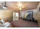 Basement home theater is fully furnished, including a projector, screen, surround sound, and comfortable seating at 200 Glenview Ct, Woodstock, GA 30188