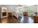 Relaxing main bedroom with hardwood floors, two windows, and ensuite bathroom access at 200 Glenview Ct, Woodstock, GA 30188