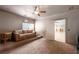 Inviting media room with a plush sofa, projector, and neutral color scheme, perfect for home entertainment at 200 Glenview Ct, Woodstock, GA 30188