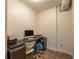Functional home office with a desk, ergonomic chair, and ample storage space for organization at 200 Glenview Ct, Woodstock, GA 30188