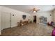 Finished basement playroom featuring a ceiling fan, wall-mounted speakers, and a large shelving unit at 200 Glenview Ct, Woodstock, GA 30188