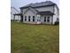 Expansive backyard featuring a covered patio, a well-manicured lawn and privacy at 2949 Longbush, Duluth, GA 30097