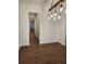 The dining room features wood floors and an industrial style hanging light fixture at 2949 Longbush, Duluth, GA 30097