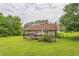 Large backyard with a spacious deck, great for outdoor relaxation or entertaining at 3333 Old Salem Se Rd, Conyers, GA 30013