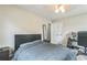 Neutral bedroom with ceiling fan, desk and comfortable décor for a relaxing and functional space at 3333 Old Salem Se Rd, Conyers, GA 30013