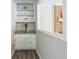 Functional butler's pantry with granite counters, storage cabinets and shelves offers space for serving and storage at 3333 Old Salem Se Rd, Conyers, GA 30013