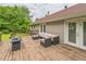 Enjoy a relaxing day on this deck with plush outdoor seating area and a small fire table at 3333 Old Salem Se Rd, Conyers, GA 30013