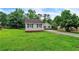 Spacious front yard with a single-story home and a long driveway at 3333 Old Salem Se Rd, Conyers, GA 30013
