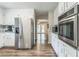 Bright kitchen with stainless steel appliances, granite countertops, and ample cabinet space for efficient storage at 3333 Old Salem Se Rd, Conyers, GA 30013