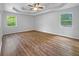 Spacious main bedroom with new hardwood floors, recessed lights, and natural light at 5080 Brownwood Dr, Powder Springs, GA 30127