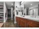 Modern bathroom with double sinks, a walk-in shower, and stylish cabinetry at 845 Spring Nw St # 129, Atlanta, GA 30308