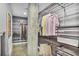 Well-organized walk-in closet with custom shelving and ample storage space at 845 Spring Nw St # 129, Atlanta, GA 30308