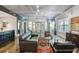 Open living space with floor-to-ceiling windows, a modern kitchen, and a comfortable seating area, perfect for relaxation at 845 Spring Nw St # 129, Atlanta, GA 30308