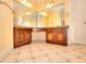 Bathroom boasting double vanities and tiled floor at 1595 Lake Lucerne Rd Sw, Lilburn, GA 30047