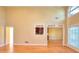 Spacious living area showcasing hardwood floors, large windows, and ample natural light at 1595 Lake Lucerne Rd Sw, Lilburn, GA 30047